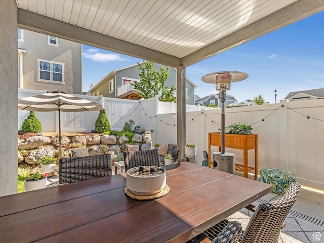 6612 W Terrace Wash Ln S Unit 119, West Jordan, UT 84081 - fenced backyard with a patio area and outdoor dining space
