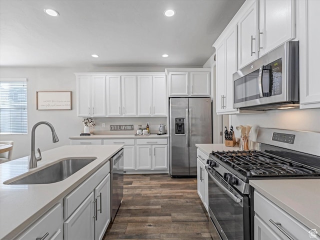6612 W Terrace Wash Ln S Unit 119, West Jordan, UT 84081 - kitchen featuring stainless steel appliances, recessed lighting, light countertops, white cabinets, and dark wood-type flooring