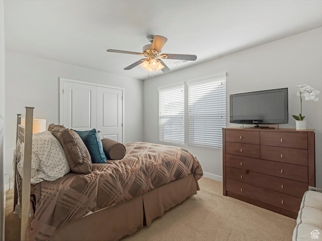 6612 W Terrace Wash Ln S Unit 119, West Jordan, UT 84081 - bedroom featuring light carpet, a closet, and a ceiling fan