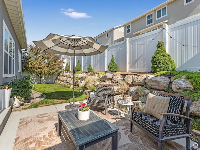 6612 W Terrace Wash Ln S Unit 119, West Jordan, UT 84081 - fenced backyard featuring a patio area