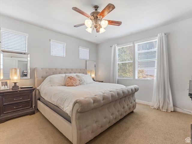 6612 W Terrace Wash Ln S Unit 119, West Jordan, UT 84081 - bedroom featuring light colored carpet and a ceiling fan