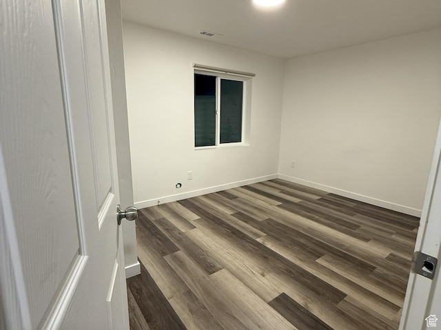 2563 N Velvet Moon Dr W Unit 625, Saratoga Springs, UT 84045 - spare room with dark wood finished floors and baseboards