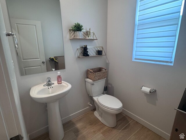 2563 N Velvet Moon Dr W Unit 625, Saratoga Springs, UT 84045 - bathroom featuring toilet and wood finished floors