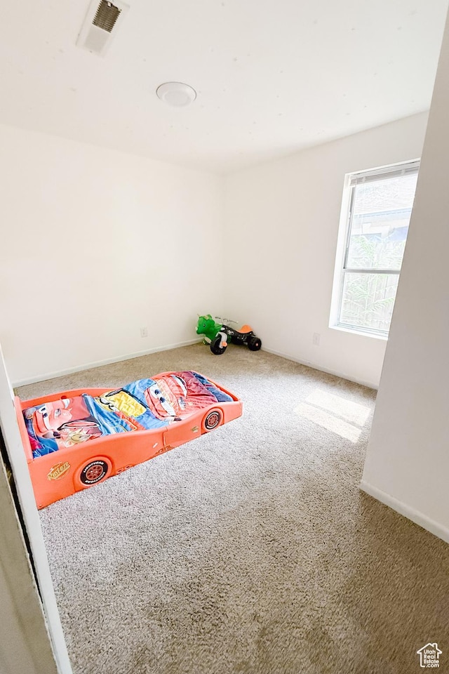 311 W Center St, Springville, UT 84663 - recreation room with carpet flooring and baseboards
