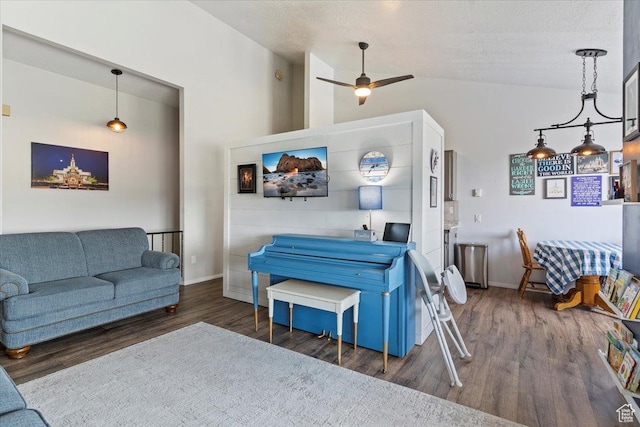 885 S 1650 E Unit B-25, Clearfield, UT 84015 - living room featuring vaulted ceiling, wood finished floors, and ceiling fan