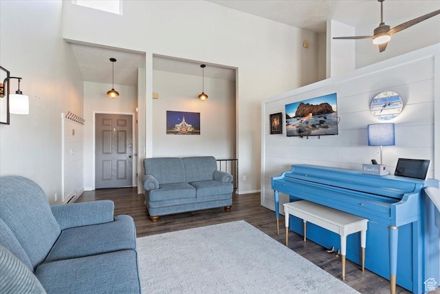 885 S 1650 E Unit B-25, Clearfield, UT 84015 - living room with wood finished floors, a towering ceiling, and a ceiling fan