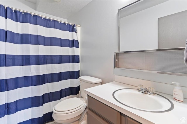 885 S 1650 E Unit B-25, Clearfield, UT 84015 - bathroom featuring vanity, a textured ceiling, and curtained shower