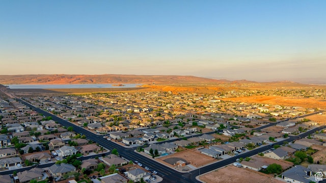 3410 W 2490 S, Hurricane, UT 84737 - aerial view of property and surrounding area featuring nearby suburban area and a water and mountain view