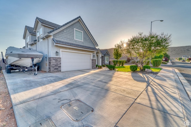 3410 W 2490 S, Hurricane, UT 84737 - view of home's exterior with stone siding and driveway