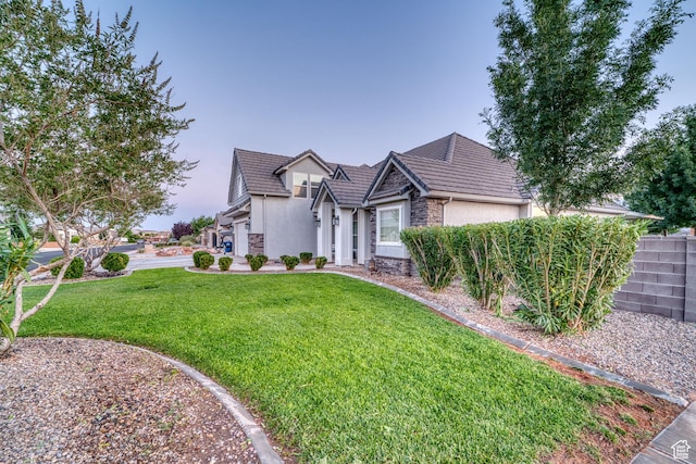 3410 W 2490 S, Hurricane, UT 84737 - view of front of home featuring stone siding, stucco siding, and a tile roof