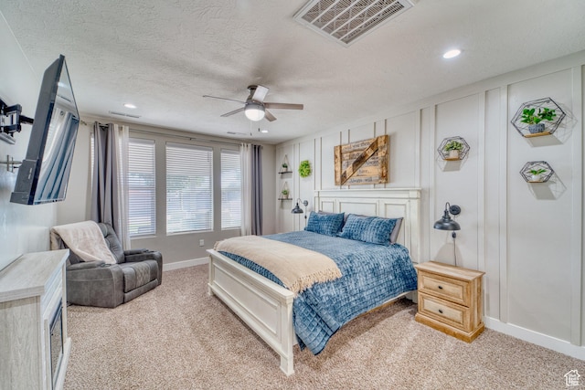 3410 W 2490 S, Hurricane, UT 84737 - bedroom with a decorative wall, light colored carpet, recessed lighting, a textured ceiling, and a ceiling fan