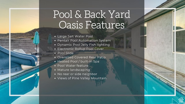 3410 W 2490 S, Hurricane, UT 84737 - view of swimming pool featuring a water slide, a patio area, and a mountain view