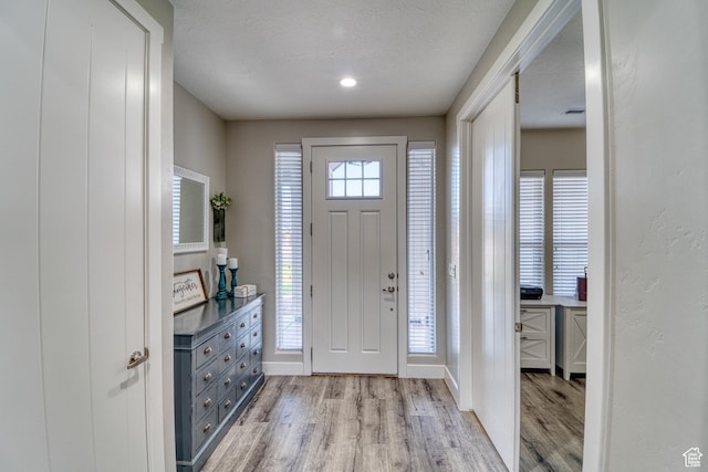3410 W 2490 S, Hurricane, UT 84737 - entrance foyer featuring light wood-style floors and baseboards