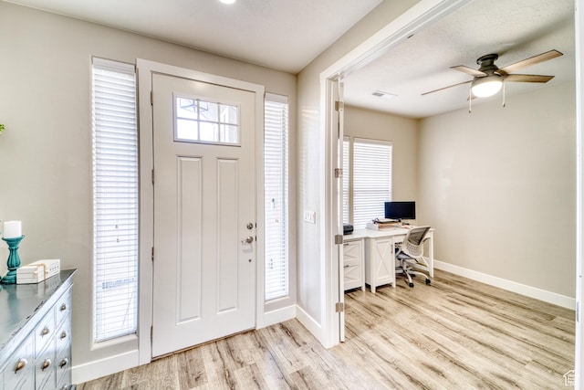 3410 W 2490 S, Hurricane, UT 84737 - entryway with light wood-type flooring, a ceiling fan, and healthy amount of natural light