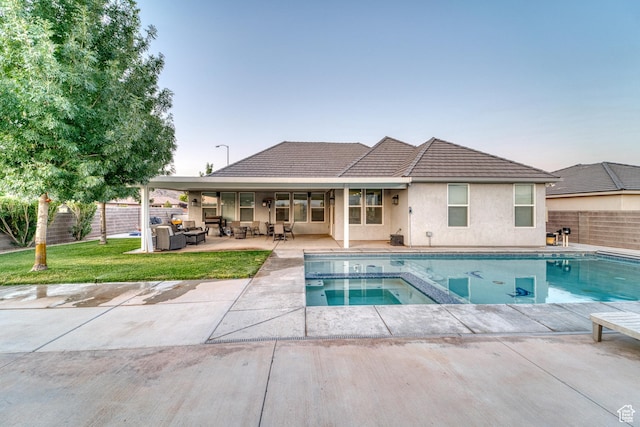 3410 W 2490 S, Hurricane, UT 84737 - view of pool with outdoor lounge area, a patio, a fenced backyard, and a pool with connected hot tub