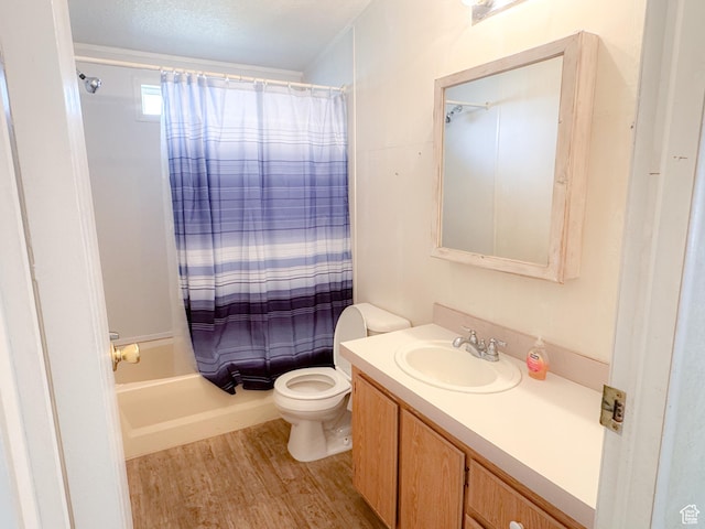 912 S W Redview Dr, Monroe, UT 84754 - bathroom featuring wood finished floors, vanity, shower / bathtub combination with curtain, and a textured ceiling