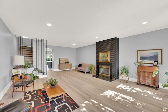 468 N E St, Salt Lake City, UT 84103 - living area with wood finished floors, a brick fireplace, and recessed lighting