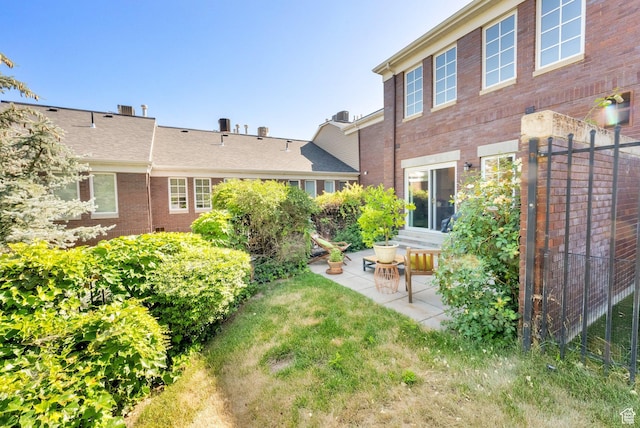 468 N E St, Salt Lake City, UT 84103 - view of yard with a patio area
