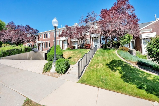 468 N E St, Salt Lake City, UT 84103 - multi unit property featuring a front yard and a residential view