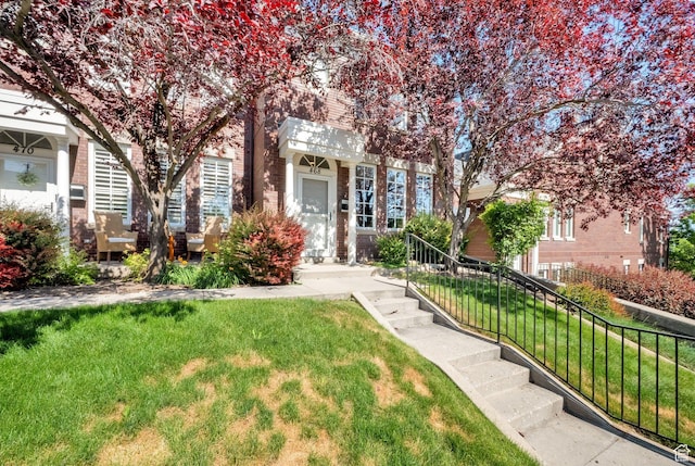 468 N E St, Salt Lake City, UT 84103 - view of property hidden behind natural elements with brick siding