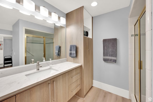 468 N E St, Salt Lake City, UT 84103 - full bath with a stall shower, vanity, and wood finished floors