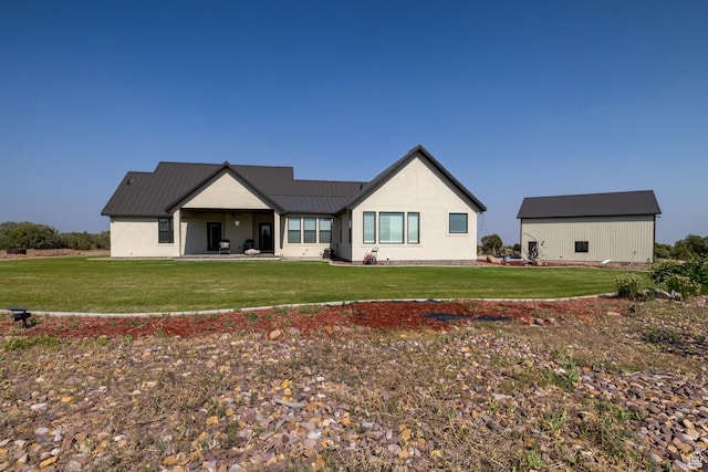 10371 N 400 W, Roosevelt, UT 84066 - back of property with a yard and a metal roof