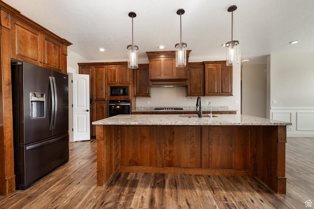 10371 N 400 W, Roosevelt, UT 84066 - kitchen with appliances with stainless steel finishes, dark wood-style flooring, a large island, recessed lighting, and pendant lighting