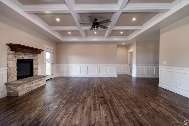 10371 N 400 W, Roosevelt, UT 84066 - unfurnished living room with beamed ceiling, ceiling fan, dark wood-type flooring, a stone fireplace, and coffered ceiling