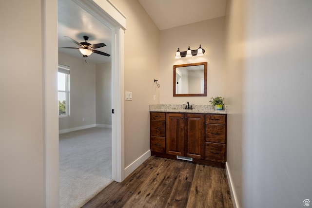 10371 N 400 W, Roosevelt, UT 84066 - bathroom with vanity, a ceiling fan, and wood finished floors