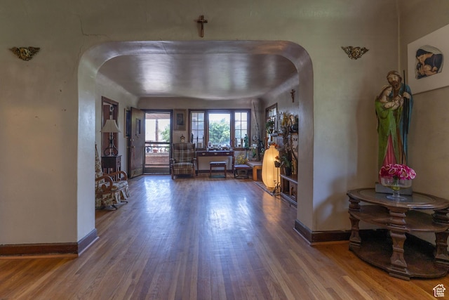 550 S Cheyenne St W, Salt Lake City, UT 84104 - foyer entrance featuring arched walkways and wood finished floors