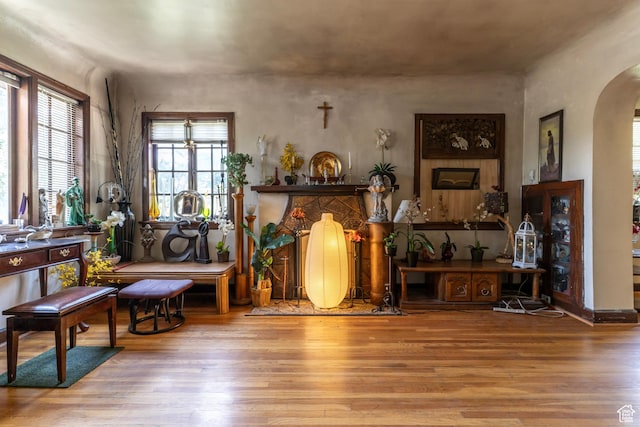 550 S Cheyenne St W, Salt Lake City, UT 84104 - sitting room featuring arched walkways and wood finished floors