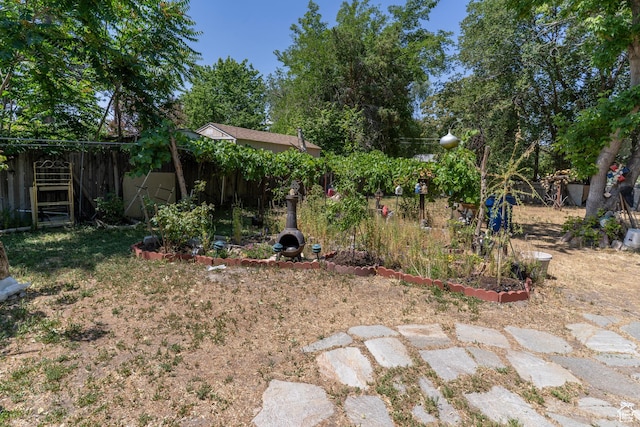 550 S Cheyenne St W, Salt Lake City, UT 84104 - view of yard featuring a vegetable garden