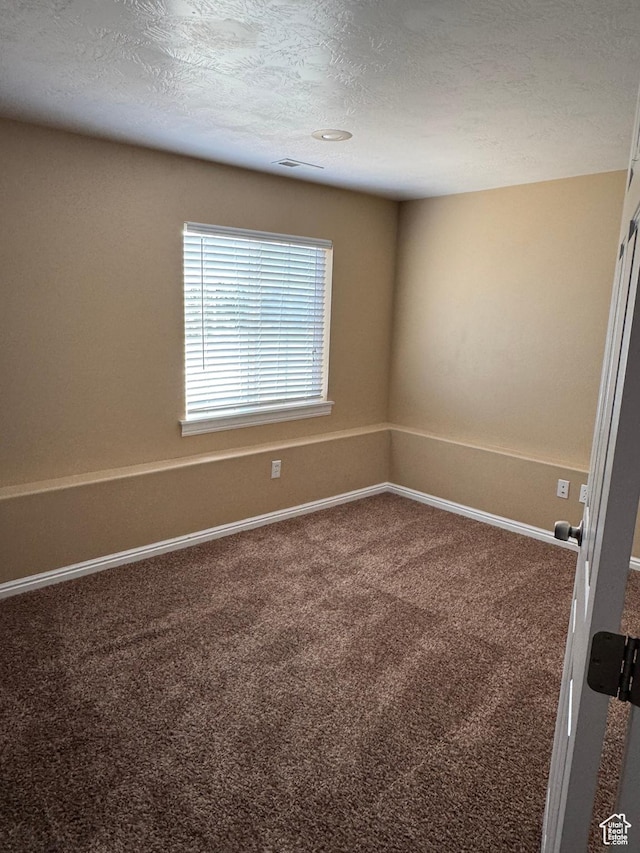 584 S Loafer Dr, Payson, UT 84651 - carpeted empty room with baseboards and a textured ceiling