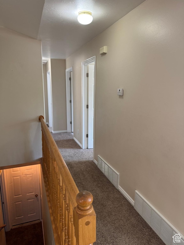 584 S Loafer Dr, Payson, UT 84651 - corridor with an upstairs landing and dark colored carpet