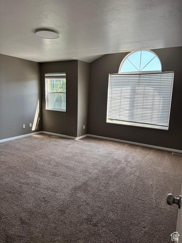 584 S Loafer Dr, Payson, UT 84651 - carpeted spare room with baseboards and a textured ceiling
