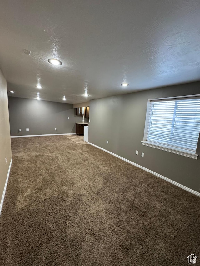 584 S Loafer Dr, Payson, UT 84651 - below grade area with carpet, a textured ceiling, and recessed lighting
