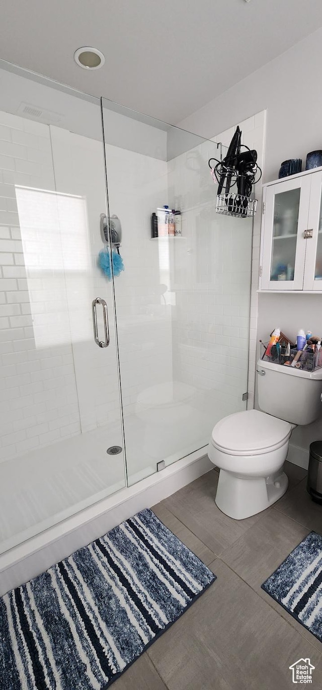 5332 W Scout Plane Ln, South Jordan, UT 84009 - full bathroom featuring a shower stall and tile patterned floors