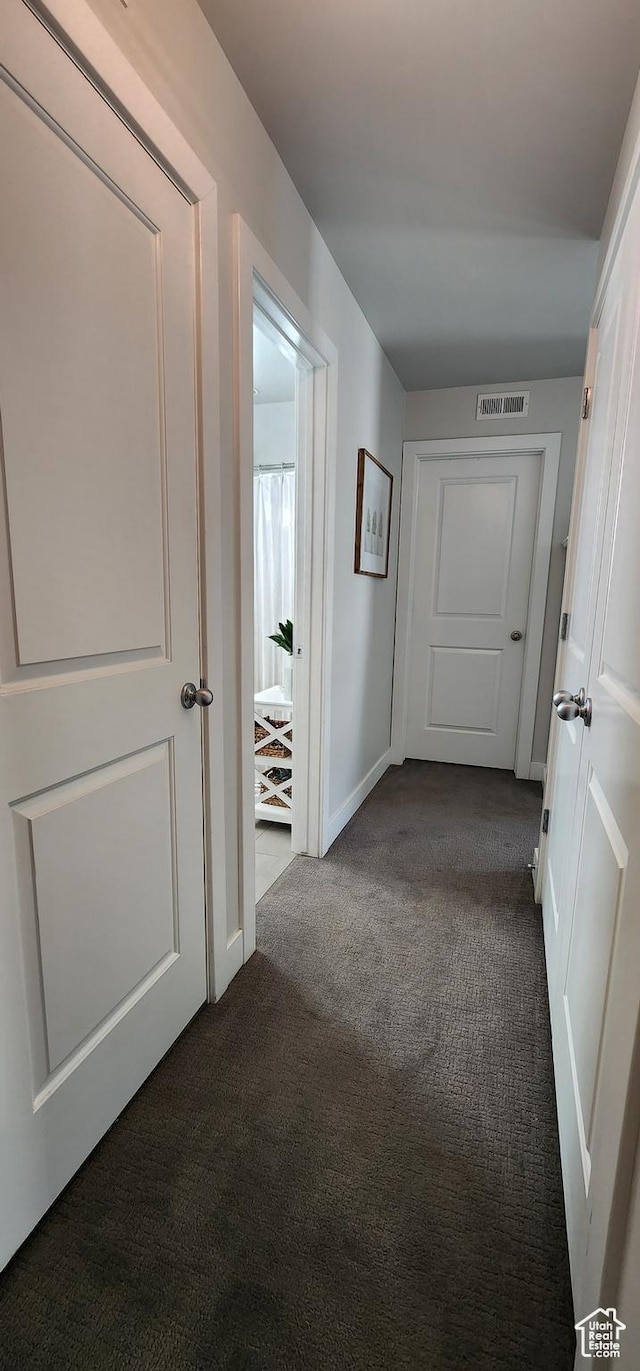 5332 W Scout Plane Ln, South Jordan, UT 84009 - hallway featuring dark carpet and baseboards