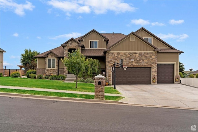 469 W 5700 S, Washington Terrace, UT 84405 - craftsman house featuring stone siding, board and batten siding, driveway, and an attached garage