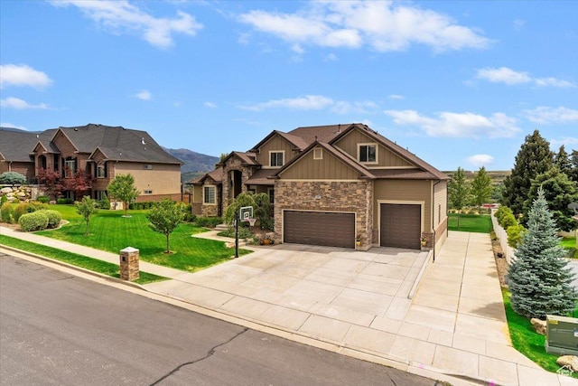 469 W 5700 S, Washington Terrace, UT 84405 - craftsman-style house with board and batten siding, stone siding, a front lawn, concrete driveway, and a garage