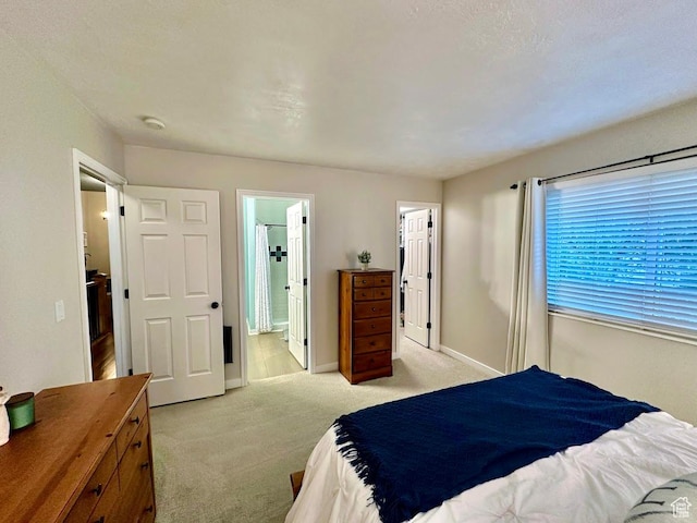8675 S Pebblecreek Rd, West Jordan, UT 84081 - bedroom featuring light carpet and connected bathroom