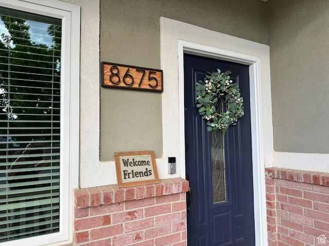 8675 S Pebblecreek Rd, West Jordan, UT 84081 - entrance to property with stucco siding