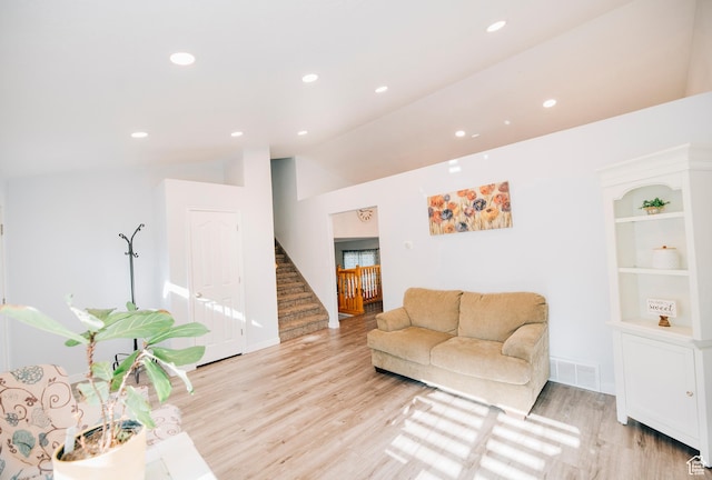9961 N 4680 W, Cedar Hills, UT 84062 - living room with stairway, light wood-style flooring, vaulted ceiling, and recessed lighting