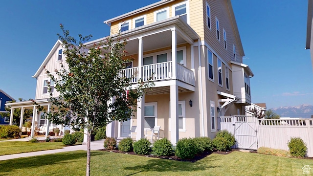 11393 S Prosperity Rd W, South Jordan, UT 84009 - view of front facade featuring a gate and a balcony