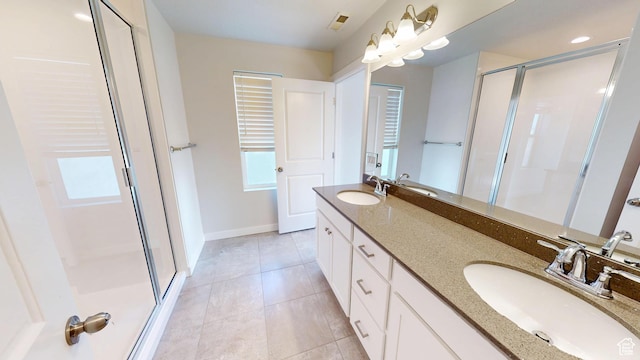 11393 S Prosperity Rd W, South Jordan, UT 84009 - bathroom with a shower stall, double vanity, and tile patterned flooring