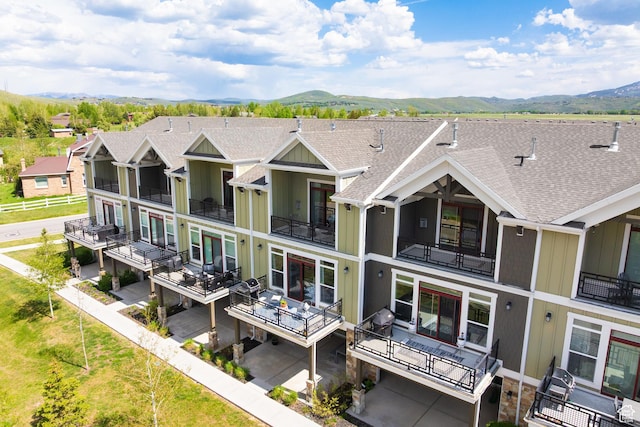 1348 Fiddich Glen Ln, Park City, UT 84098 - rear view of property featuring a mountain view and a shingled roof