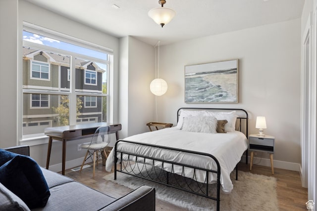 1348 Fiddich Glen Ln, Park City, UT 84098 - bedroom featuring wood finished floors and baseboards