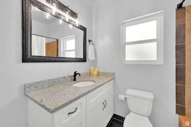 1203 25th St, Ogden, UT 84401 - full bath with vanity, tile patterned floors, and curtained shower