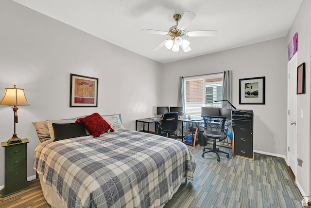 1203 25th St, Ogden, UT 84401 - bedroom with a desk and a ceiling fan