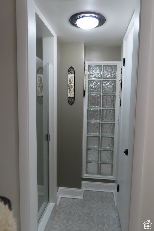 1785 29th Unit 301, Ogden, UT 84403 - hallway featuring tile patterned flooring and baseboards